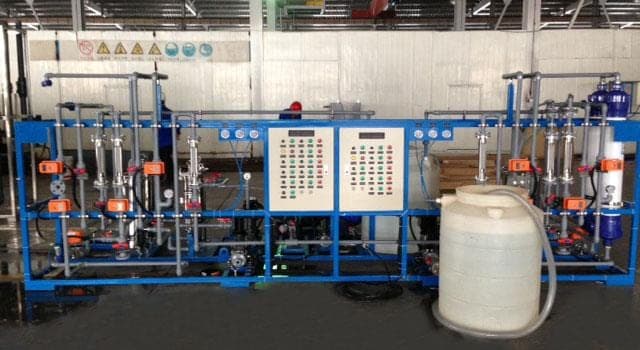 Skid-mounted water treatment pilot unit during factory acceptance testing.